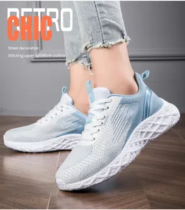 Close-up view of lightweight and breathable light blue fly-knit running shoes for women