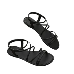Sandali gladiatore bassi neri con cinturino elastico e listini sottili da donna