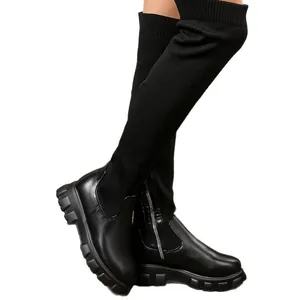 Stylish black over-the-knee boots with thick platform sole and elastic knit shaft