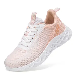 Women's lightweight pink knit running shoes with breathable mesh and white textured sole