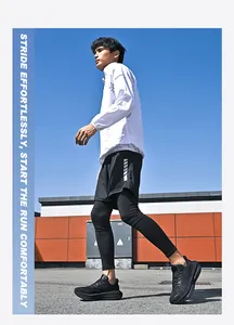 Man wearing black cushioned running shoes walking outdoors in sports gear
