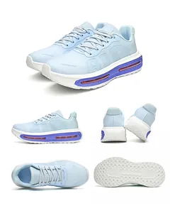 Detailed view of light blue running shoes with breathable mesh and purple air cushion