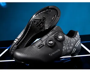 Detailed view of professional black cycling shoes featuring carbon fiber soles and dual rotary buckles