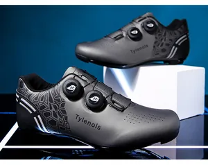 Professional grey cycling shoes with dual rotary buckles and breathable mesh design.