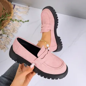 Pink suede platform loafers for women with a rugged lug sole detail