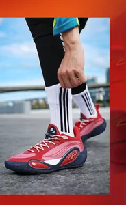 Red low-top basketball sneakers with non-slip soles for outdoor court training