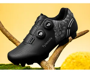 Side detail of black professional cycling shoe with dual rotating adjustment buckles.