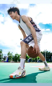 Close-up of stylish low-top basketball training shoes for men and women on an outdoor court