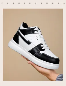 Detailed view of stylish black and white platform sneakers with durable thick white soles.