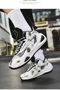 Action shot of stylish black and white basketball sneakers featuring geometric patterns