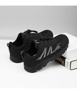 Professional detail view of black mesh walking sneakers for men and women with quick-lace system