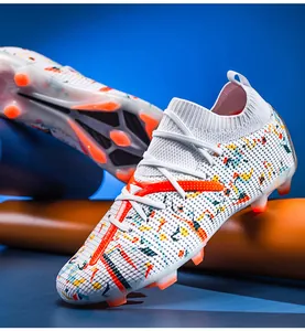 High-quality professional soccer cleats with knit collar and vibrant splatter pattern