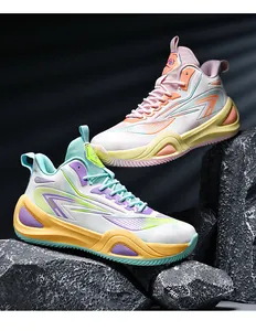 Professional detail of anti-slip colorful basketball shoes on textured dark rocks