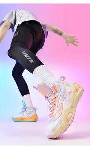 Professional action shot of vibrant non-slip training basketball sneakers on model
