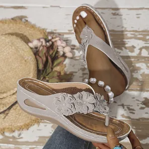 Chanclas de cuña grises para mujer con diseño de tres flores y suela de plataforma