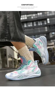Detail view of low-top basketball shoes with vibrant cyan and pink accents