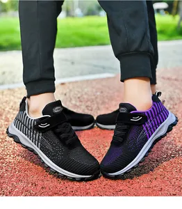 Breathable fly-knit walking shoes with non-slip soles for men and women in sport style