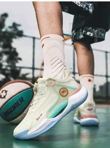Detail shot of low-top basketball shoe featuring rotating buckle and luminous mesh upper