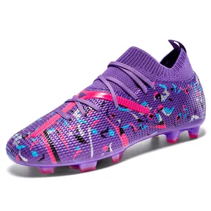 Detailed side view of purple professional football cleats with high-top sock collar design