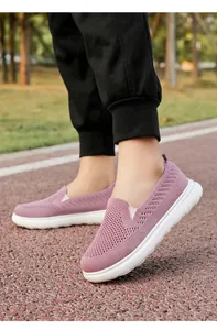 Mauve breathable knitted mesh loafers shown on-foot during an outdoor walking session