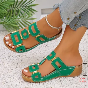 Stylish green platform wedge sandals featuring geometric cutouts and gold buckles