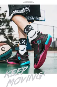 Professional teen basketball shoes with rotary buckle and luminous mesh upper on court.