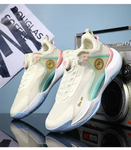 Detailed view of low-top basketball shoes featuring a rotating buckle and mesh fabric