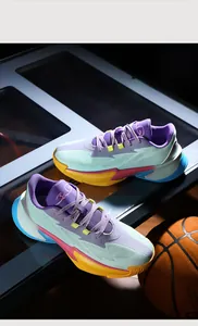 Vibrant low-top basketball shoes for training in mint green and purple colorway.
