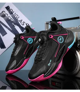 Black low-top basketball shoes featuring a rotary knob closure and pink accents