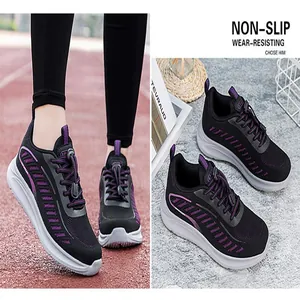 Close-up detail of black breathable mesh walking shoes with non-slip white soles