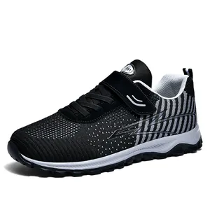 Breathable fly-knit running shoe featuring a secure velcro strap and cushioned sole