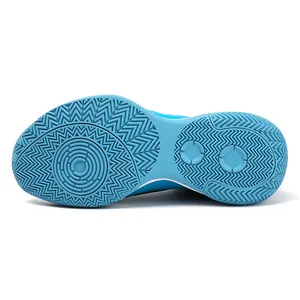 Detailed view of the durable blue rubber outsole for professional basketball shoes.