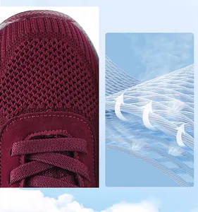Vista macro dettagliata del tessuto mesh bordeaux traspirante sulle scarpe da camminata