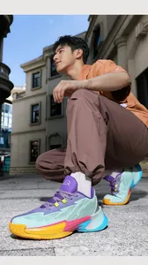Detailed outdoor view of colorful 8507 low-top basketball shoes worn by a model