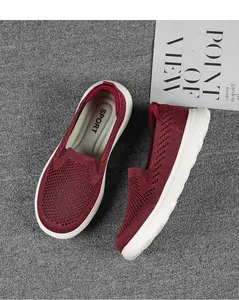 Top-down view of breathable burgundy flying knit mesh slip-on shoes for casual wear