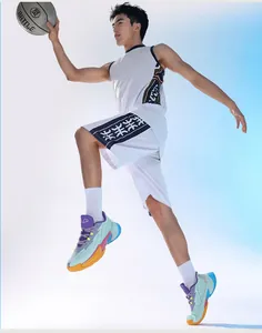Dynamic view of multi-colored low-top basketball shoes during an athletic jump
