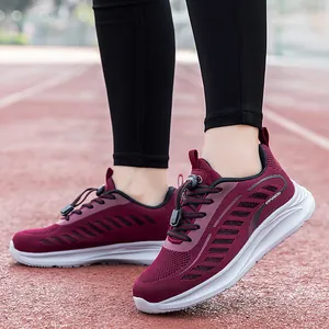 Breathable fly-woven walking shoes for seniors in burgundy with quick-lace toggles