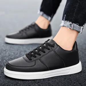 Classic black low-top skate sneakers with white flat sole for stylish casual daily wear