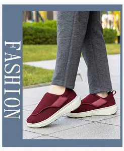 Vista esterna di scarpe da passeggio in mesh bordeaux con chiusura a cinturino regolabile