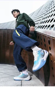 Stylish low-top basketball shoes for training, featuring a blue and white gradient design