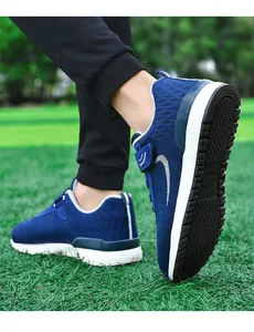 Close-up view of breathable blue flyknit walking shoes featuring flexible non-slip soles.