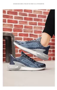 Detailed side view of men's breathable mesh running shoes with thick cushioning soles