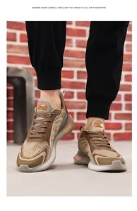 Detailed view of breathable mesh running shoes with thick cushioning soles for men