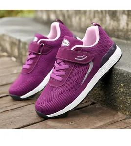 Detailed side view of purple breathable mesh walking shoes with hook-and-loop strap
