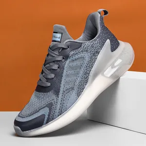 Breathable men's mesh running shoes featuring lightweight popcorn cushioning sole in grey