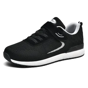 Lightweight black fly-knit walking sneakers for men and women with breathable mesh mesh upper