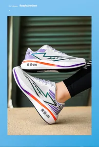 Breathable white mesh running shoes with vibrant purple and orange accents for jogging.