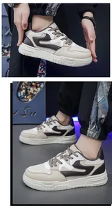 Primer plano de zapatillas de skate retro para hombre con patchwork crema y marrón.