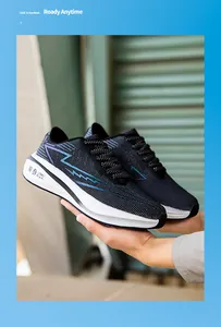 Detail view of breathable mesh running shoes with cushioning white soles for athletes.