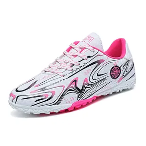 White low-top soccer shoe with pink abstract patterns and M LODI logo for training